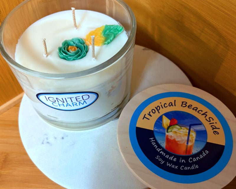 Tropical BeachSide candle with decorative elements on a marble surface